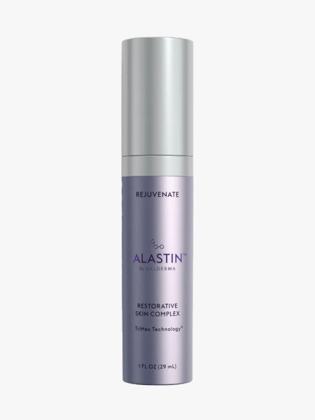 Alastin Restorative Skin Complex purple bottle on light gray background